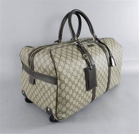 gucci travel bag with wheels|gucci travel bags sale.